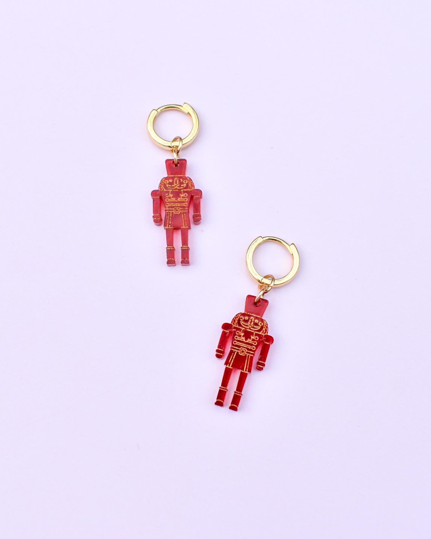 NUTCRACKER CHARM HUGGIES