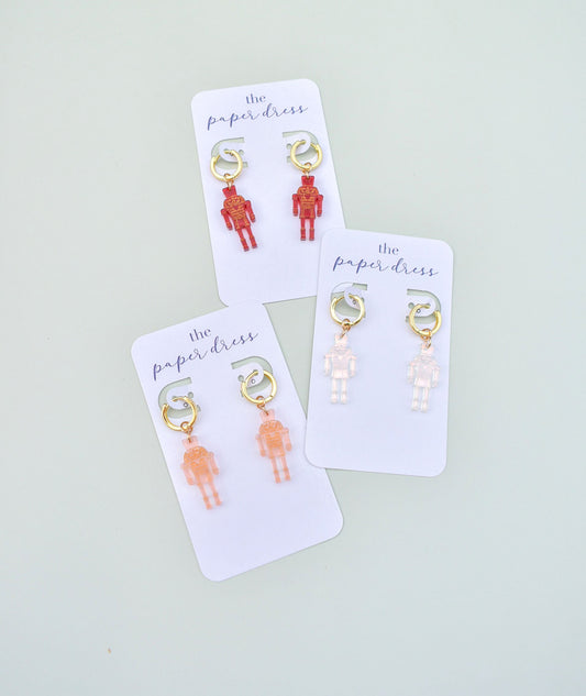 NUTCRACKER CHARM HUGGIES