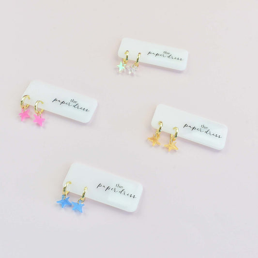 mini star charm gold huggie earrings